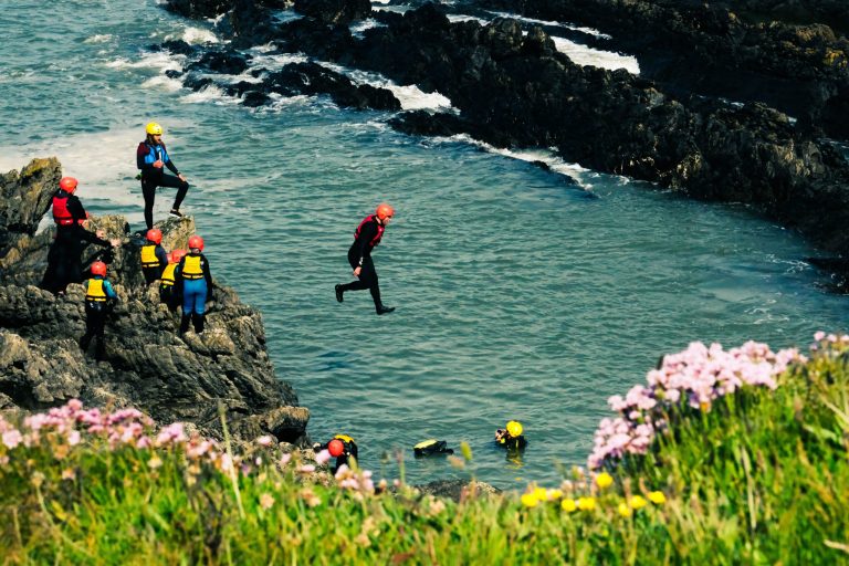 coasteering-lUq78qc5lQs-unsplash-scaled